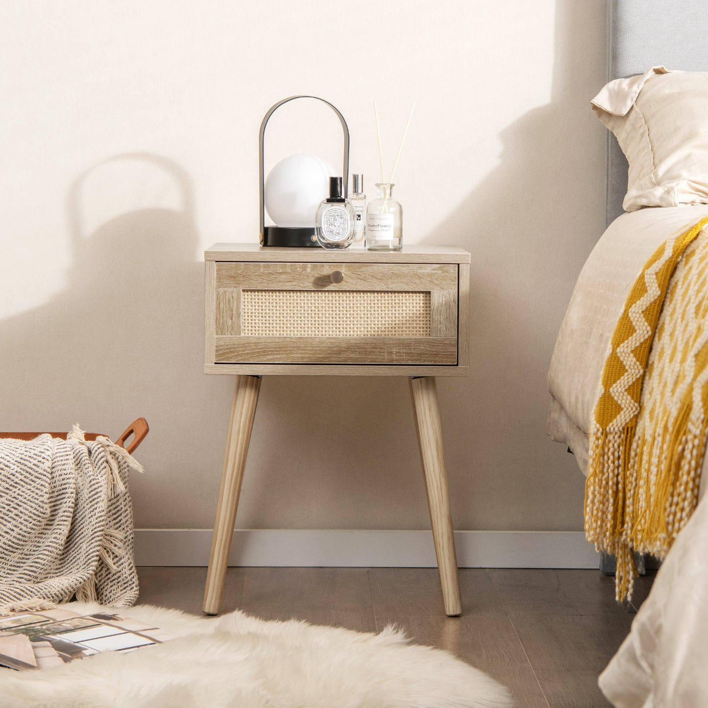 Natural Wood Nightstand with Rattan Drawer and Tapered Legs for Modern Interiors