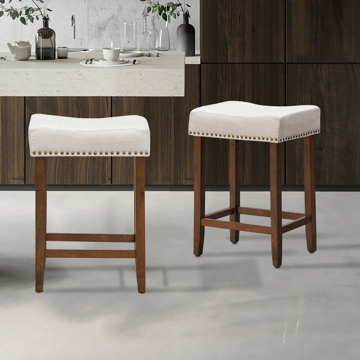 Set of 2 Upholstered 24 Inch Saddle Bar Stools with Nailhead Trim and Solid Wood Legs – Beige