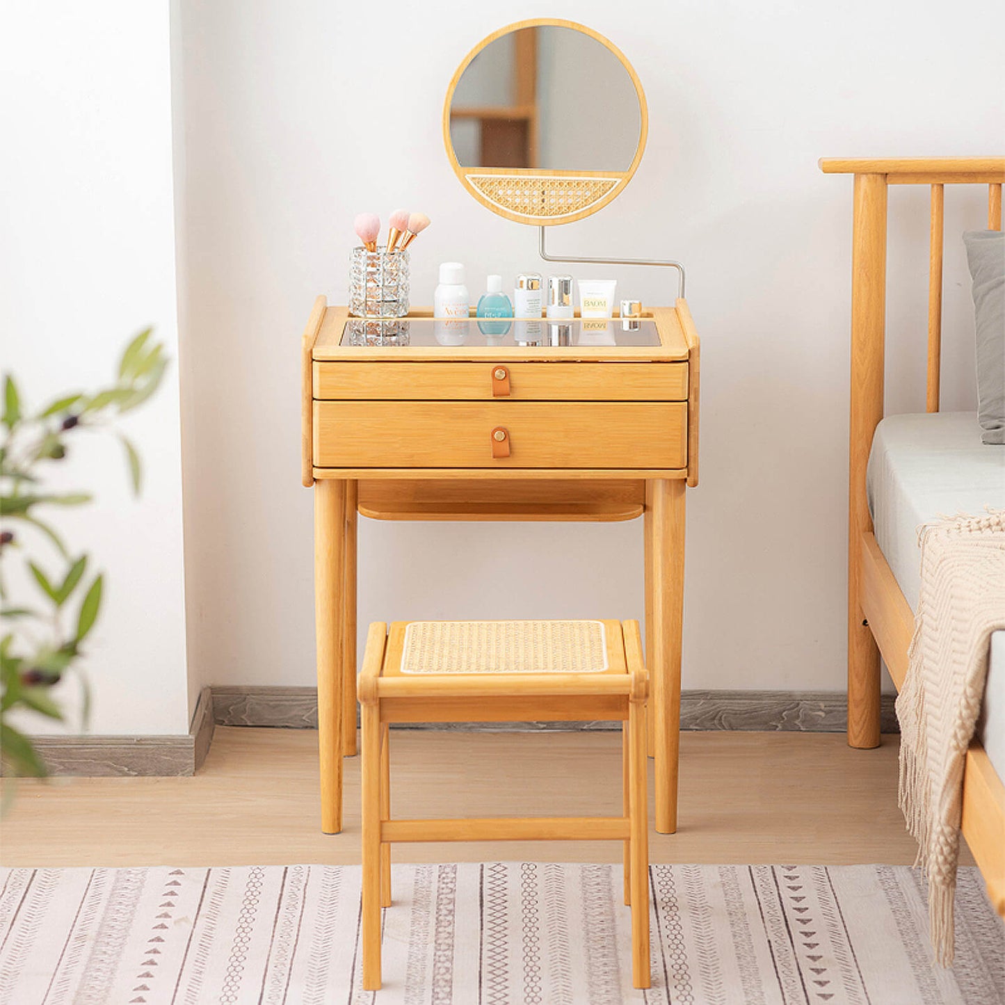 Compact Bamboo Vanity Set with Rotating Mirror, Glass Top, and Storage Drawers
