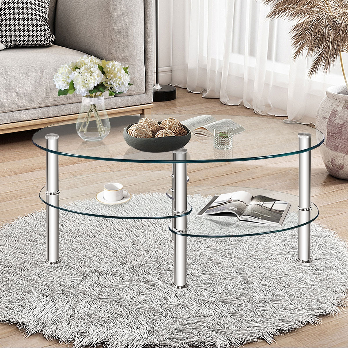 Oval Tempered Glass Coffee Table with Double Storage Shelves and Metal Frame - Transparent
